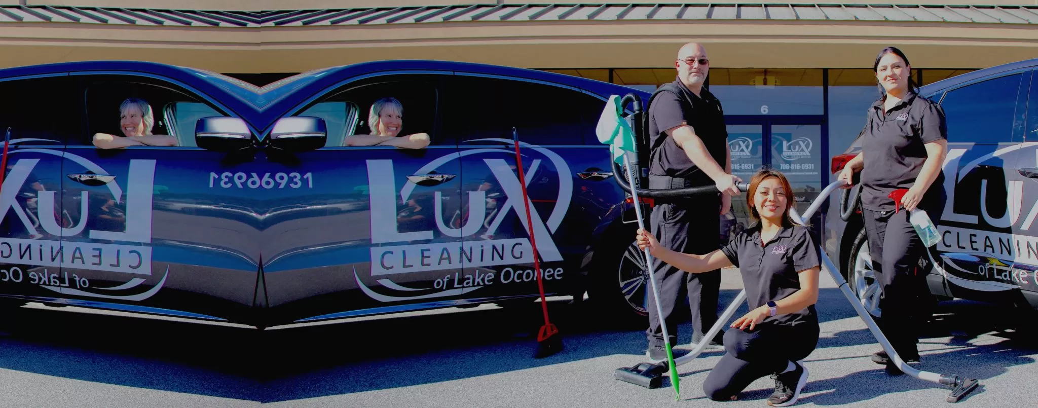 The owner of LuX Cleaning of Lake Oconee, smiling outside a Eatonton home